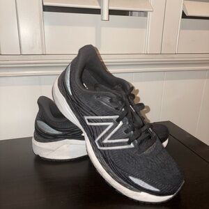 new balance black and white athletic shoes